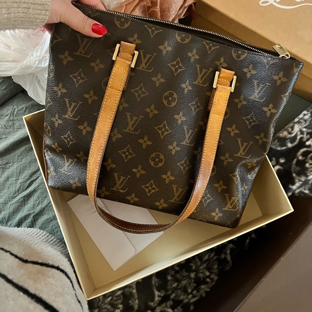 Louis Vuitton, comes with box and dust bag.